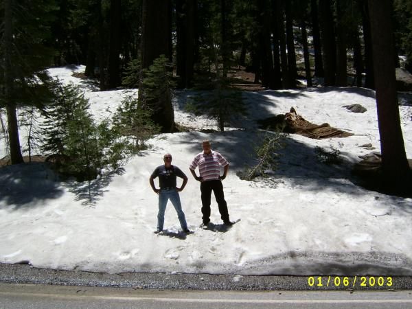 Cap'n Quirk and ic23b standing in the snows of Yosemite two and a half hours before arriving at the 