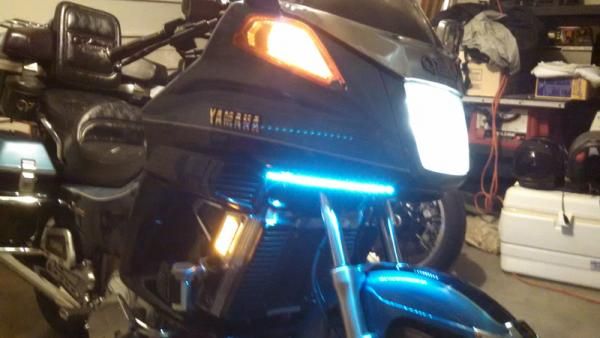 Replaced front reflector with LED light. Added LED strip under cowls for low speed visibility.