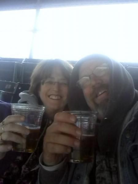 I won tickets to Cubs opening day 2011.  This is me and Colleen, drinkin a couple of old styles in t