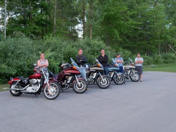 From L-R: My gf Lori and her HD XL883C Sportster, nephews Paul & Ryan, my dad, Dean and myself w