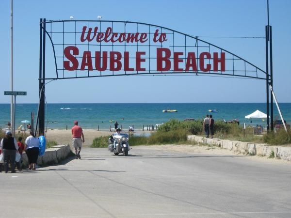 Coming off the beach and under the famous Sauble sign.