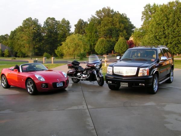My Son's GXP, my RSV, my Wife's Escalade.