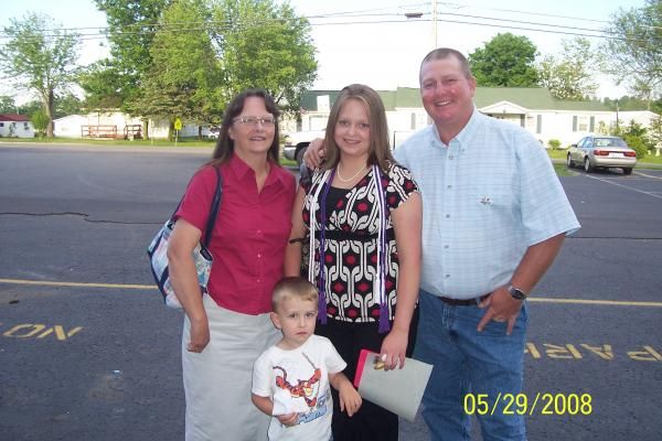My family -2008
My daughter, Crystal in center, her senior graduation 18 yrs old. My son Isaiah 3 y
