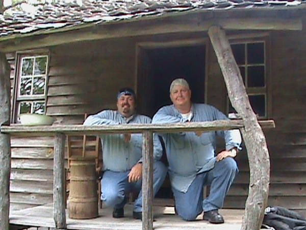 Brother on right, me on left. Back porch of old cabin. The man that used to live here was a shoe mak