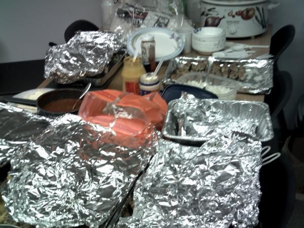 Salads, meats, rolls and sides all waiting under foil. Lets eat!