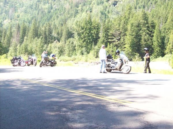 A Venture and a Harley meeting up with an RSTD and a VStar 1300.