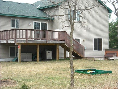 Back side. large deck with leading to awesome HOT TUB. Yeaaa