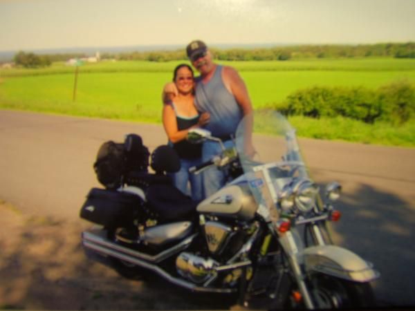 My wife & I with of our  2004 Suzuki Intruder 1500 just outside Lowville, N.Y. simmer of 2007. D