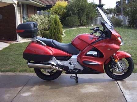ST1300 (Big Red )Honda told me I was only female in Australia riding the big Honda. Husband is now l