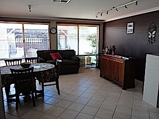 This area is a large open plan area that we have made family, dining rooms... and made a bar for AL 