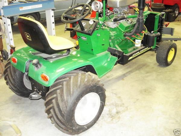 there's nothing like hooking on to a sled with your John Deere  riding tractor with a Chevy 350sb wi