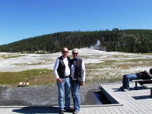 Rick and Nina with Old Faithful burbling in the background.