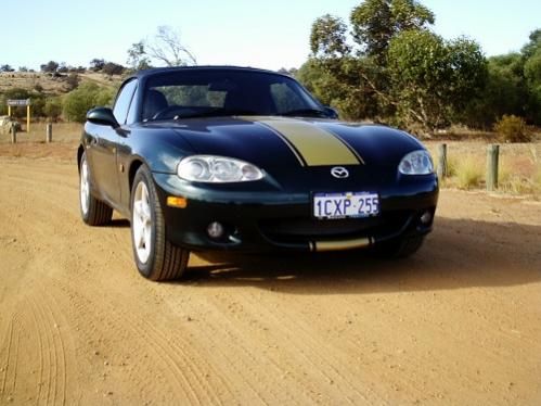 Mazda MX5 The latest Purchase, Has Air conditioning for when it is too hot to ride