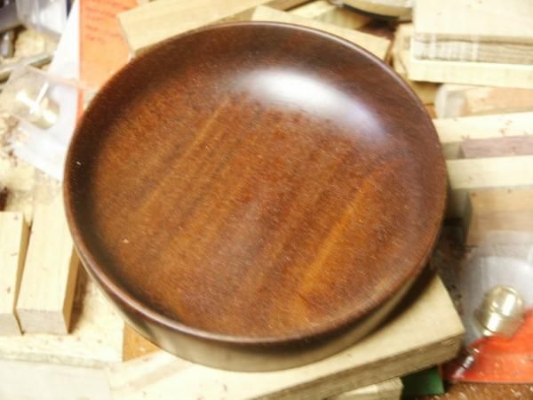 the first bowl I turned that did not fly off the lathe.  Teak finished with teak oil.